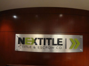 Nextitle: Brushed Alum backing W/ Acrylic Lettering by Focal Point Costa Mesa