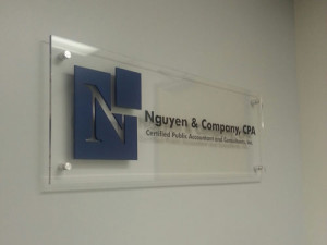 Nguyen Co. Santa Ana: Custom Business lobby sign by Focal Point Signs & Imaging Costa Mesa