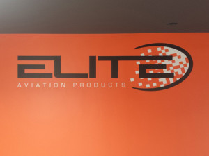 Elite Aviation Products: Lobby Sign w/ Carbon Fiber Vinyl on Black letters & Color Vinyl for Gray by Focal Point Signs Costa Mesa