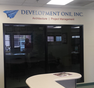 Development One, Inc Santa Ana: Mounted Acrylic W/ Vinyl Print & Painted Acrylic Letters by Focal Point Costa Mesa 