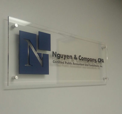 Nguyen Co. Santa Ana: Custom Business lobby sign by Focal Point Signs & Imaging Costa Mesa