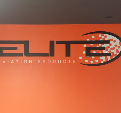 Elite Aviation Products: Lobby Sign w/ Carbon Fiber Vinyl on Black letters & Color Vinyl for Gray by Focal Point Signs Costa Mesa